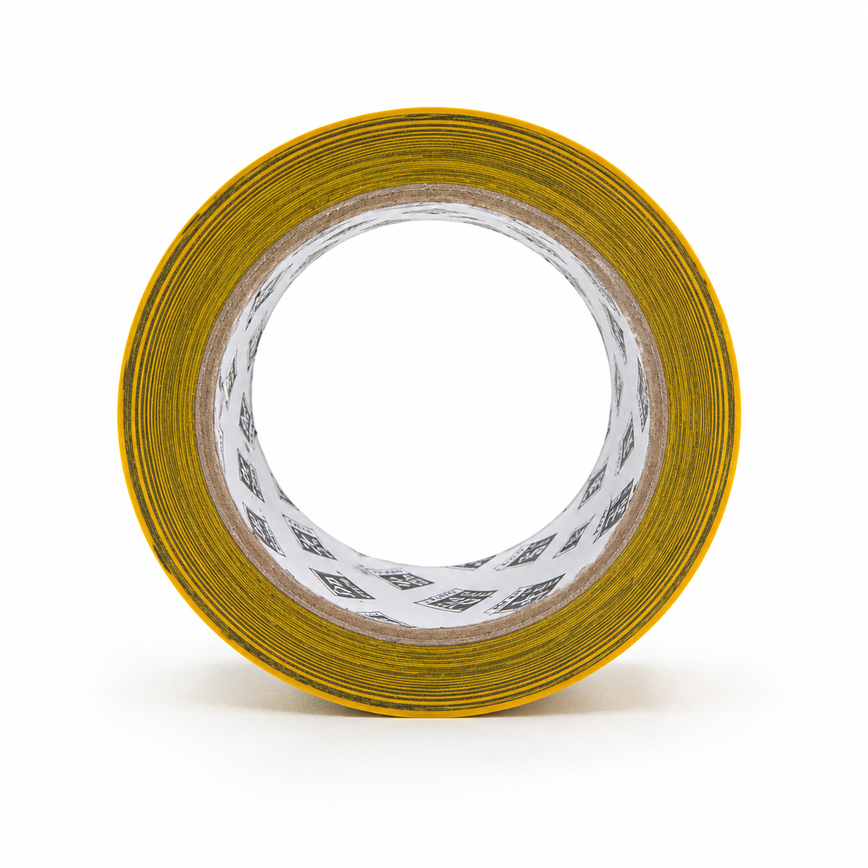 A roll of hazard tape seen face on, looking straight through the core, with the wound layers of yellow and black visible around the edge.