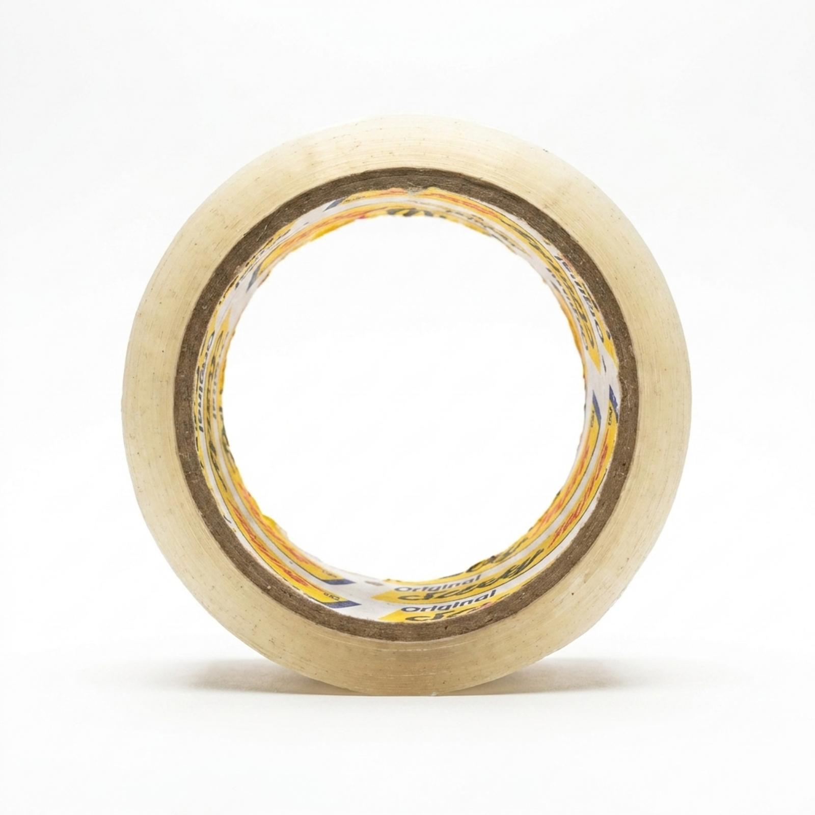 A roll of clear packaging tape seen face on, looking straight through the core, the wound transparent film visible all round.