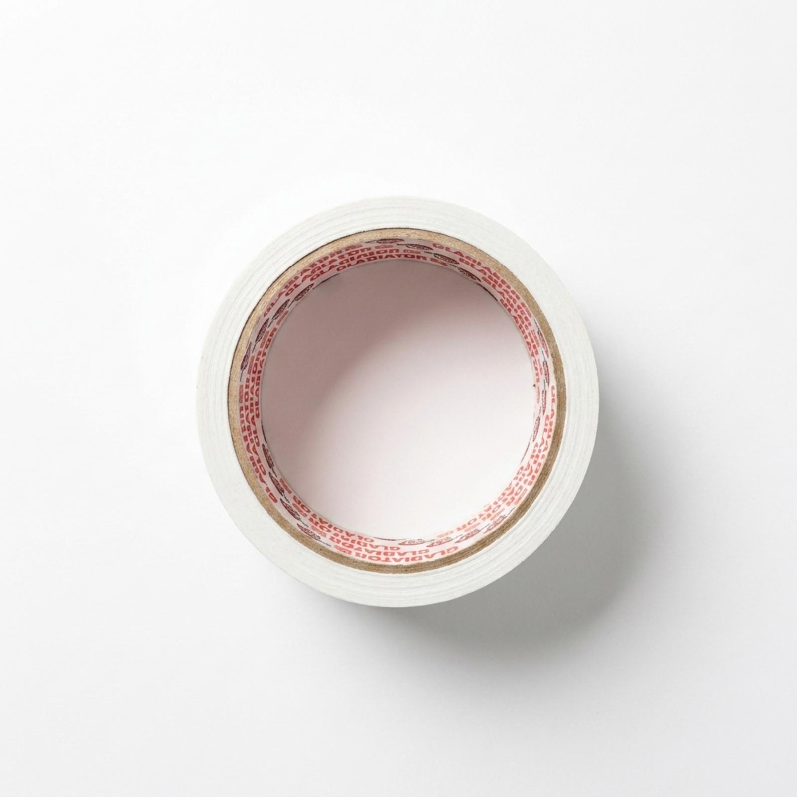 A roll of white cloth tape photographed from directly above, looking down through the branded cardboard core.
