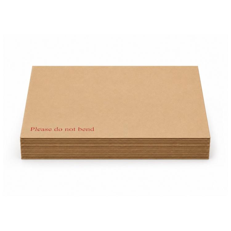 A neat stack of about ten C4 hardbacked manilla envelopes seen from the front edge, the board thickness of each visible along the side.