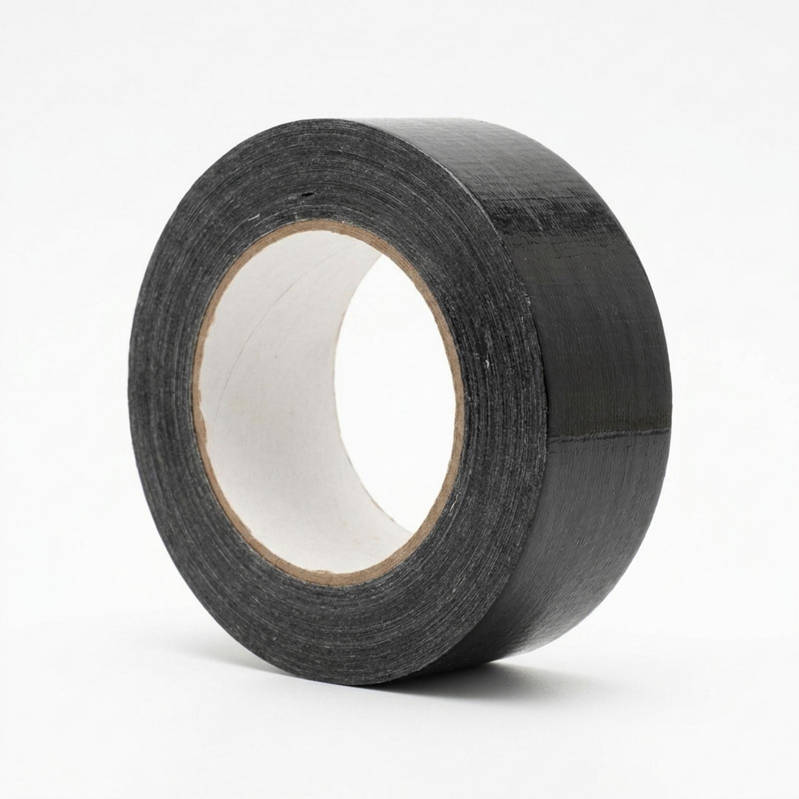 A roll of black cloth duct tape at an angle, showing the black surface across the width of the roll and the cardboard core.